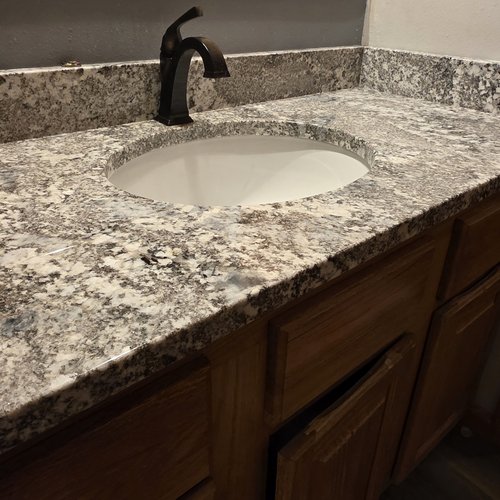 Silver Falls Granite in Bathroom with Undermount Porcelain Sink